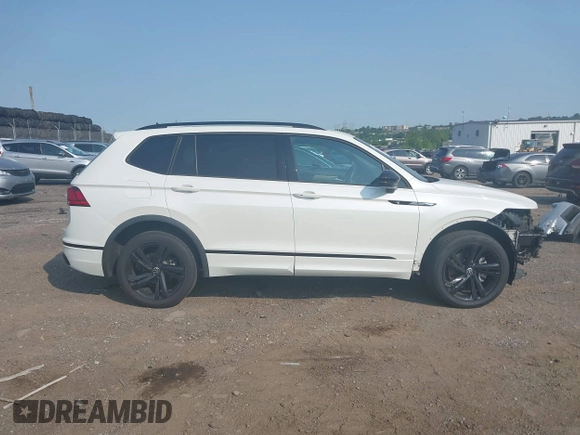 2023 Volkswagen Tiguan SE R-Line Black z VIN 3VV8B7AX9PM055640, wystawiony jako IAAI lot #42411380 z przebiegiem 68 922 mil mil oraz . Historia ofert i sprzedaży dostępna na DreamBid. Obrazek 13.