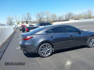 2020 Mazda 6 Grand Touring with VIN JM1GL1TY0L1522025, listed as a IAAI auction lot 41876429 with 68,101 mi miles and . Bid and sale history available at DreamBid. Image 13.