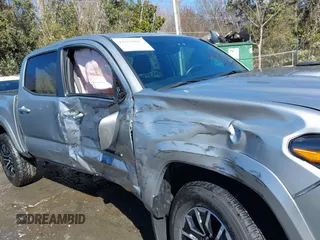 2023 Toyota Tacoma 4WD SR with VIN 3TYCZ5AN7PT122067, listed as a IAAI auction lot 41624047 with 27,483 mi miles. Bid and sale history available at carsss.com. Image 6.