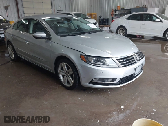 2015 Volkswagen CC R-Line z VIN WVWBP7AN9FE826400, wystawiony jako IAAI lot #40931896 z przebiegiem 117 022 mil mil oraz . Historia ofert i sprzedaży dostępna na DreamBid. Obrazek 1.