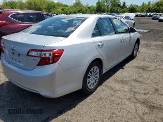 2014 Toyota Camry L with VIN 4T4BF1FK1ER390579, listed as a Copart auction lot 55284295 with 133,926 mi miles and Salvage Title. Bid and sale history available at DreamBid. Image 3.