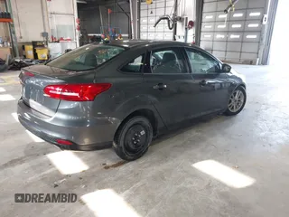 2017 Ford Focus SE with VIN 1FADP3F29HL220440, listed as a IAAI auction lot 41975013 with 40,295 mi miles and . Bid and sale history available at DreamBid. Image 4.