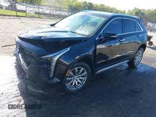 2021 Cadillac XT4 FWD Premium Luxury with VIN 1GYFZCR43MF052422, listed as a IAAI auction lot 41985859 with 25,112 mi miles. Bid and sale history available at carsss.com. Image 2.
