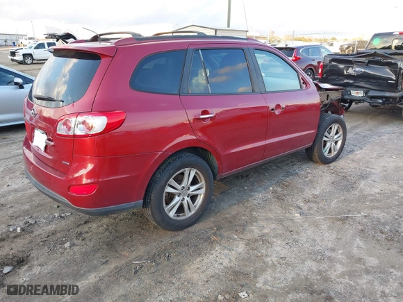 2012 Hyundai Santa Fe Limited with VIN 5XYZK3AB8CG117309, listed as a IAAI auction lot 41145625 with 196,477 mi miles. Bid and sale history available at carsss.com. Image 4.