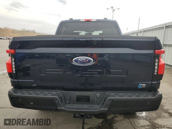 2023 Ford F-150 Lightning Pro with VIN 1FT6W1EV8PWG38071, listed as a Copart auction lot 51091495 with 13,687 mi miles and Salvage title. Bid and sale history available at DreamBid. Image 6.