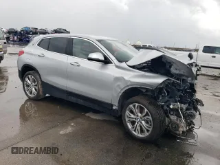 2018 BMW X2 sDrive28i with VIN WBXYJ3C32JEJ75719, listed as a Copart auction lot 60884755 with Not provided miles and Salvage title. Bid and sale history available at DreamBid. Image 4.