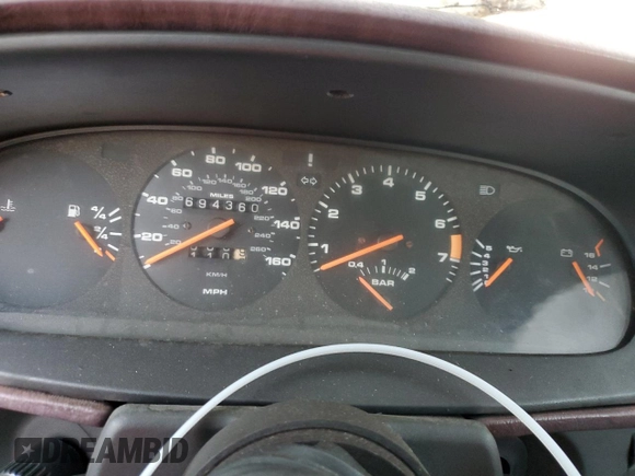 1986 Porsche 944 with VIN WP0AA0951GN156691, listed as a Copart auction lot 79901794 with 694,360 mi miles and Salvage Title. Bid and sale history available at DreamBid. Image 9.