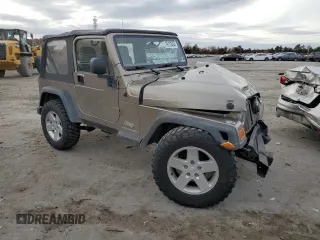 2003 Jeep Wrangler SE with VIN 1J4FA29183P324978, listed as a Copart auction lot 79172464 with Not provided miles and Salvage title. Bid and sale history available at DreamBid. Image 4.