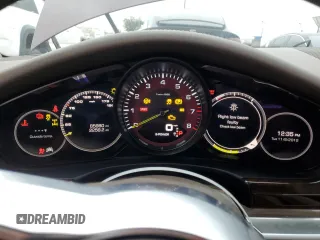 2018 Porsche Panamera 4 E-Hybrid с VIN WP0AE2A76JL128093, выставлен на аукционе Copart как лот 61402255 с пробегом 85 980 миль миль и Списание • Salvage title. История ставок и продаж доступна на DreamBid. Изображение 9.