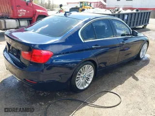 2013 BMW 3 Series 328i xDrive with VIN WBA3B3C54DF532965, listed as a IAAI auction lot 41955104 with 150,455 mi miles. Bid and sale history available at carsss.com. Image 4.