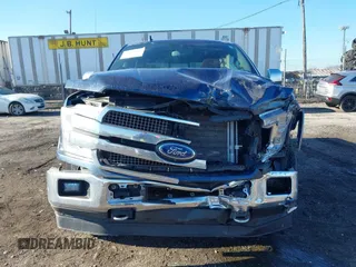 2020 Ford F-150 XL z VIN 1FTEW1E53LFB91722, wystawiony jako IAAI lot #41673112 z przebiegiem 70 930 mil mil oraz . Historia ofert i sprzedaży dostępna na DreamBid. Obrazek 11.