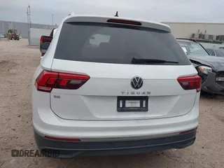 2023 Volkswagen Tiguan SE with VIN 3VVNB7AX8PM099759, listed as a IAAI auction lot 41340885 with 28,562 mi miles and . Bid and sale history available at DreamBid. Image 16.