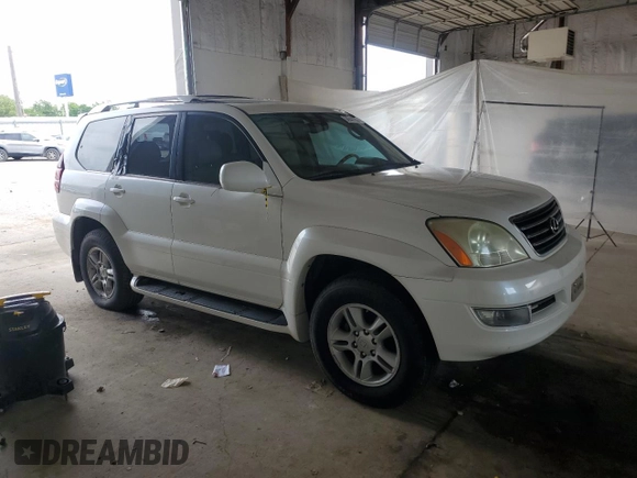 2006 Lexus GX 470 z VIN JTJBT20X060110741, wystawiony jako Copart lot #56944755 z przebiegiem 234 412 mil mil oraz Tytuł czysty. Historia ofert i sprzedaży dostępna na DreamBid. Obrazek 4.
