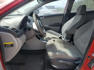 2012 Hyundai Accent GLS z VIN KMHCT4AE6CU047077, wystawiony jako Copart lot #54951655 z przebiegiem 153 614 mil mil oraz Tytuł czysty. Historia ofert i sprzedaży dostępna na DreamBid. Obrazek 7.