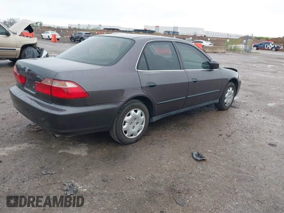 1999 Honda Accord LX with VIN 1HGCG5647XA154131, listed as a IAAI auction lot 41962701 with 126,673 mi miles and . Bid and sale history available at DreamBid. Image 4.