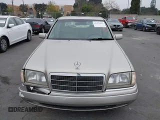 1995 Mercedes-Benz C with VIN WDBHA28E2SF191740, listed as a IAAI auction lot 41172625 with 331,540 mi miles. Bid and sale history available at carsss.com. Image 12.