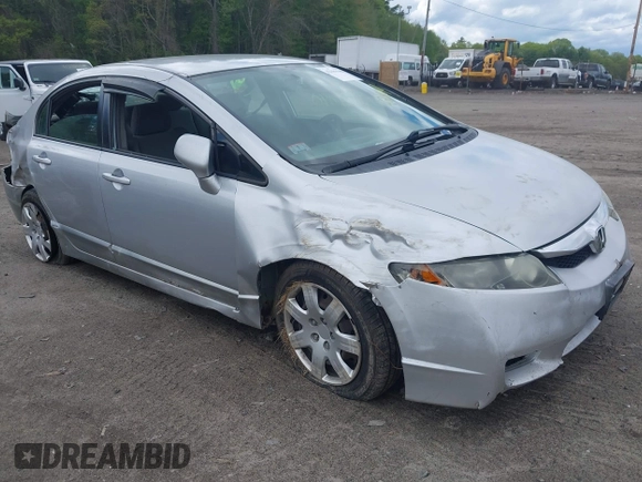 2010 Honda Civic LX with VIN 2HGFA1F59AH323381, listed as a IAAI auction lot 42181040 with 320,419 mi miles and . Bid and sale history available at DreamBid. Image 1.