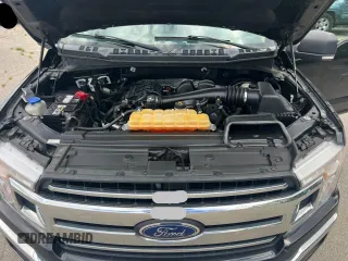 2018 Ford F-150 XL z VIN 1FTEX1CB0JKF17440, wystawiony jako Copart lot #57720105 z przebiegiem 168 009 mil mil oraz Czysty tytuł • Clean title. Historia ofert i sprzedaży dostępna na DreamBid. Obrazek 7.