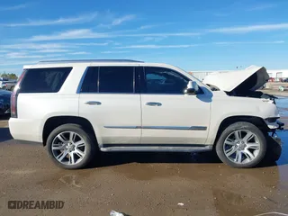 2015 Cadillac Escalade Luxury with VIN 1GYS3MKJXFR651714, listed as a IAAI auction lot 41205449 with 129,066 mi miles. Bid and sale history available at carsss.com. Image 14.