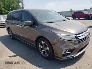 2019 Honda Odyssey Touring z VIN 5FNRL6H87KB098010, wystawiony jako Copart lot #54791505 z przebiegiem 94 477 mil mil oraz Szkoda całkowita • Salvage title. Historia ofert i sprzedaży dostępna na DreamBid. Obrazek 4.