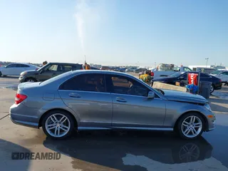 2014 Mercedes-Benz C 250 Sport with VIN WDDGF4HB0EG238946, listed as a IAAI auction lot 41973753 with 116,694 mi miles and . Bid and sale history available at DreamBid. Image 14.