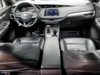 2021 Cadillac XT4 AWD Premium Luxury z VIN 1GYFZDR4XMF000937, wystawiony jako Copart lot #52406055 z przebiegiem 46 881 mil mil oraz Szkody całkowita. Historia ofert i sprzedaży dostępna na DreamBid. Obrazek 8.