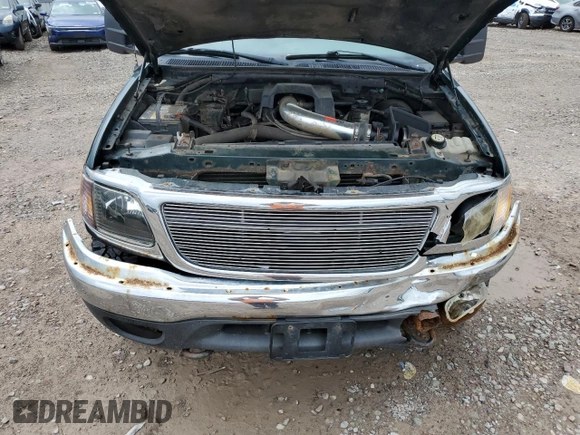 2001 Ford F-150 XL z VIN 1FTRX18L41NB56019, wystawiony jako Copart lot #62537655 z przebiegiem Nie podano mil oraz Szkoda całkowita • Salvage title. Historia ofert i sprzedaży dostępna na DreamBid. Obrazek 11.