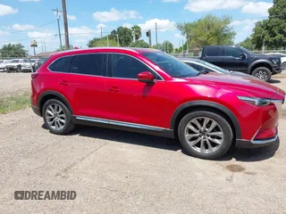2017 Mazda CX-9 Grand Touring z VIN JM3TCADY3H0140895, wystawiony jako IAAI lot #42817948 z przebiegiem 125 288 mil mil oraz . Historia ofert i sprzedaży dostępna na DreamBid. Obrazek 13.