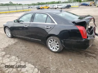 2014 Cadillac CTS Luxury AWD with VIN 1G6AX5S35E0190361, listed as a Copart auction lot 54497655 with 32,664 mi miles and Salvage title. Bid and sale history available at DreamBid. Image 2.