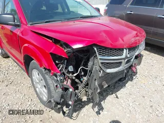 2016 Dodge Journey SE with VIN 3C4PDCAB7GT250093, listed as a IAAI auction lot 42061392 with 100,433 mi miles. Bid and sale history available at carsss.com. Image 12.