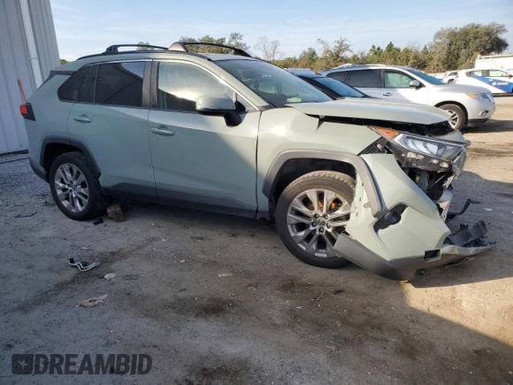 2019 Toyota RAV4 XLE Premium with VIN JTMA1RFV4KD033359, listed as a Copart auction lot 43921575 with 63,185 mi miles and Non Repairable. Bid and sale history available at carsss.com. Image 4.
