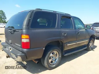 2004 Chevrolet Tahoe LS z VIN 1GNEC13V74R295259, wystawiony jako IAAI lot #42339839 z przebiegiem 264 778 mil mil oraz . Historia ofert i sprzedaży dostępna na DreamBid. Obrazek 4.