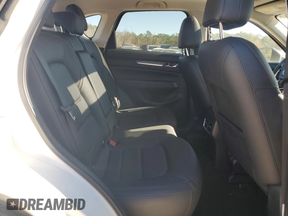 2021 Mazda CX-5 Grand Touring with VIN JM3KFBDM0M1440565, listed as a Copart auction lot 87089404 with 34,607 mi miles and Salvage Title. Bid and sale history available at carsss.com. Image 11.