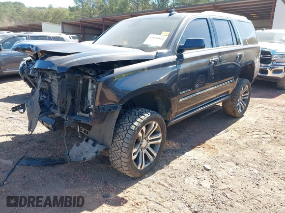 2018 GMC Yukon Denali with VIN 1GKS2CKJ6JR303263, listed as a IAAI auction lot 41633514 with 130,990 mi miles. Bid and sale history available at carsss.com. Image 16.