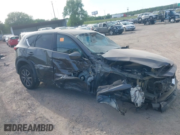 2018 Mazda CX-5 Grand Touring z VIN JM3KFADM5J1365772, wystawiony jako IAAI lot #42251805 z przebiegiem 44 599 mil mil oraz . Historia ofert i sprzedaży dostępna na DreamBid. Obrazek 12.