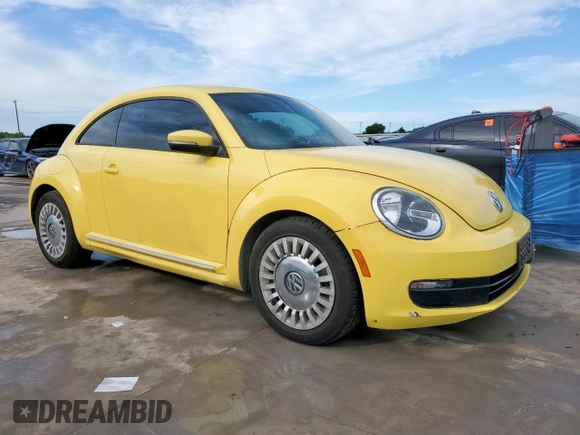 2014 Volkswagen Beetle 2.5L with VIN 3VWJX7AT2EM610372, listed as a Copart auction lot 60163345 with 121,497 mi miles and Salvage title. Bid and sale history available at DreamBid. Image 4.