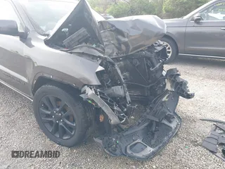 2018 Jeep Grand Cherokee Laredo E with VIN 1C4RJFAG0JC120383, listed as a IAAI auction lot 42115098 with Not Provided miles and . Bid and sale history available at DreamBid. Image 18.