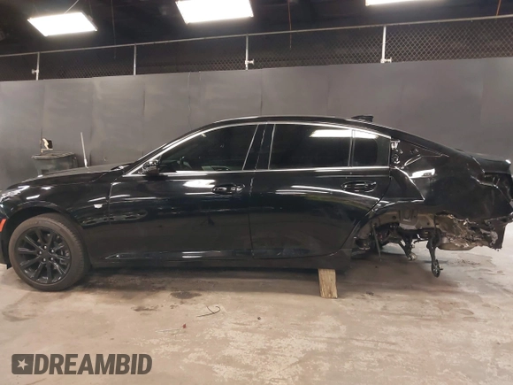 2023 Cadillac CT5 Luxury z VIN 1G6DX5RK7P0135813, wystawiony jako IAAI lot #42130722 z przebiegiem 20 738 mil mil oraz . Historia ofert i sprzedaży dostępna na DreamBid. Obrazek 15.