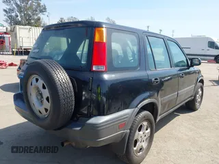 1999 Honda CR-V LX with VIN JHLRD2844XC011920, listed as a IAAI auction lot 41820203 with 224,967 mi miles. Bid and sale history available at carsss.com. Image 4.