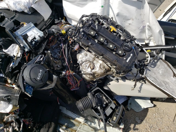 2022 Kia Seltos EX z VIN KNDERCAA0N7313584, wystawiony jako Copart lot #70715003 z przebiegiem Nie podano mil oraz Szkoda całkowita • Salvage title. Historia ofert i sprzedaży dostępna na DreamBid. Obrazek 12.