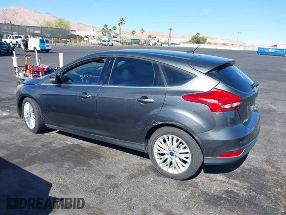 2017 Ford Focus Titanium with VIN 1FADP3N25HL299817, listed as a IAAI auction lot 42161440 with 154,974 mi miles and . Bid and sale history available at carsss.com. Image 3.