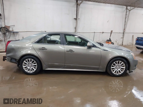 2011 Cadillac CTS Luxury with VIN 1G6DG5EY9B0135220, listed as a IAAI auction lot 42596045 with 158,912 mi miles and . Bid and sale history available at DreamBid. Image 14.