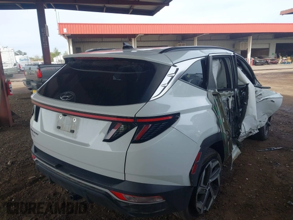 2022 Hyundai Tucson SEL with VIN 5NMJC3AE6NH060475, listed as a IAAI auction lot 41808281 with 94,694 mi miles and . Bid and sale history available at DreamBid. Image 4.