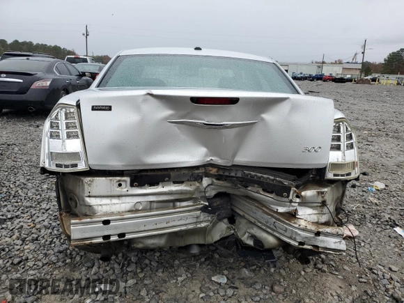 2012 Chrysler 300 Limited z VIN 2C3CCACG3CH310263, wystawiony jako Copart lot #83744764 z przebiegiem 246 532 mil mil oraz Szkoda całkowita • Salvage title. Historia ofert i sprzedaży dostępna na DreamBid. Obrazek 6.