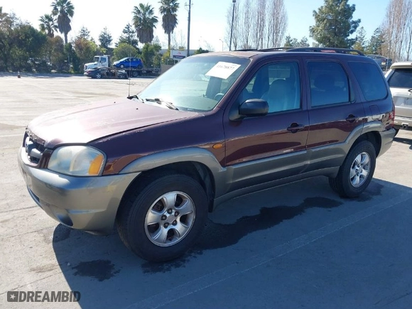 2001 Mazda Tribute LX with VIN 4F2YU08131KM39817, listed as a IAAI auction lot 41678877 with 210,715 mi miles. Bid and sale history available at carsss.com. Image 2.