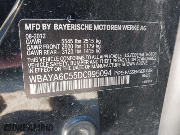 2013 BMW 7 Series 740i with VIN WBAYA6C55DC995094, listed as a IAAI auction lot 41246796 with 164,394 mi miles. Bid and sale history available at carsss.com. Image 9.
