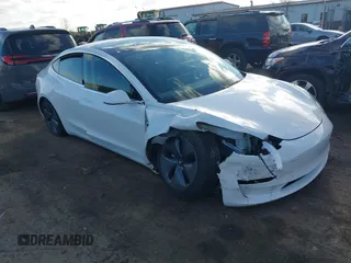 2019 Tesla Model 3 Mid Range z VIN 5YJ3E1EA4KF483051, wystawiony jako IAAI lot #40965368 z przebiegiem Nie podano mil oraz . Historia ofert i sprzedaży dostępna na DreamBid. Obrazek 1.