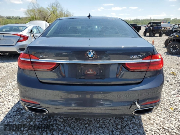 2016 BMW 7 Series 750i xDrive z VIN WBA7F2C54GG416163, wystawiony jako Copart lot #53981095 z przebiegiem 91 822 mil mil oraz Szkoda całkowita • Salvage title. Historia ofert i sprzedaży dostępna na DreamBid. Obrazek 6.