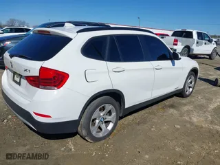 2015 BMW X1 sDrive28i with VIN WBAVM1C53FV317173, listed as a IAAI auction lot 41586385 with 146,068 mi miles. Bid and sale history available at carsss.com. Image 4.