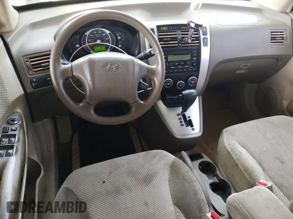 2006 Hyundai Tucson GLS with VIN KM8JN12D56U460604, listed as a Copart auction lot 78459004 with 140,947 mi miles and Salvage Title. Bid and sale history available at carsss.com. Image 8.